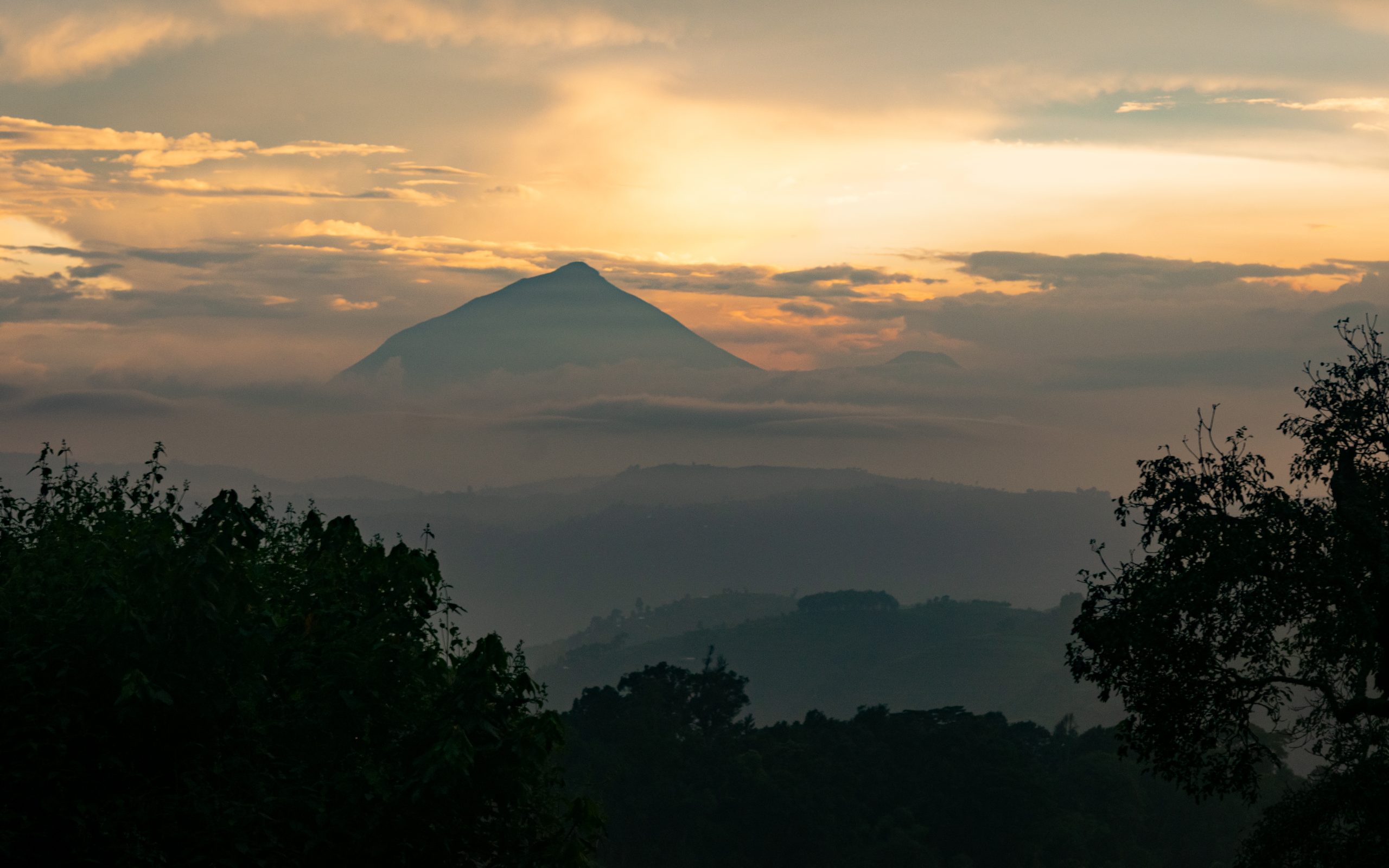 Mount Sabinyo volcano hike from the Uganda side, Uganda–Rwanda safari
